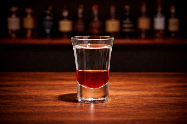 Mix of grenadine, vodka and tabasco.